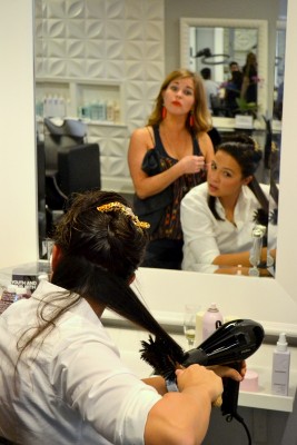 learning proper technique from the best hairstylist in Houston!